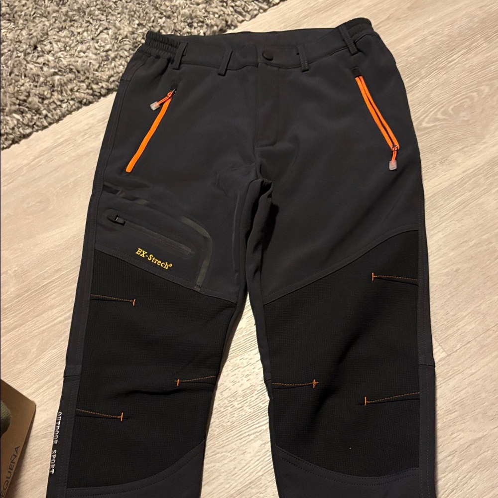 Gray and Black Pants with Orange Accents